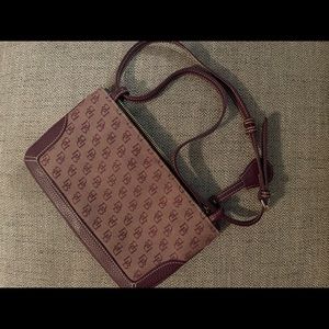 Dooney & Bourke clutch-removable, adjustable strap